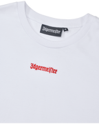 Witte cropped tee met oranje Jägermeister-logo.