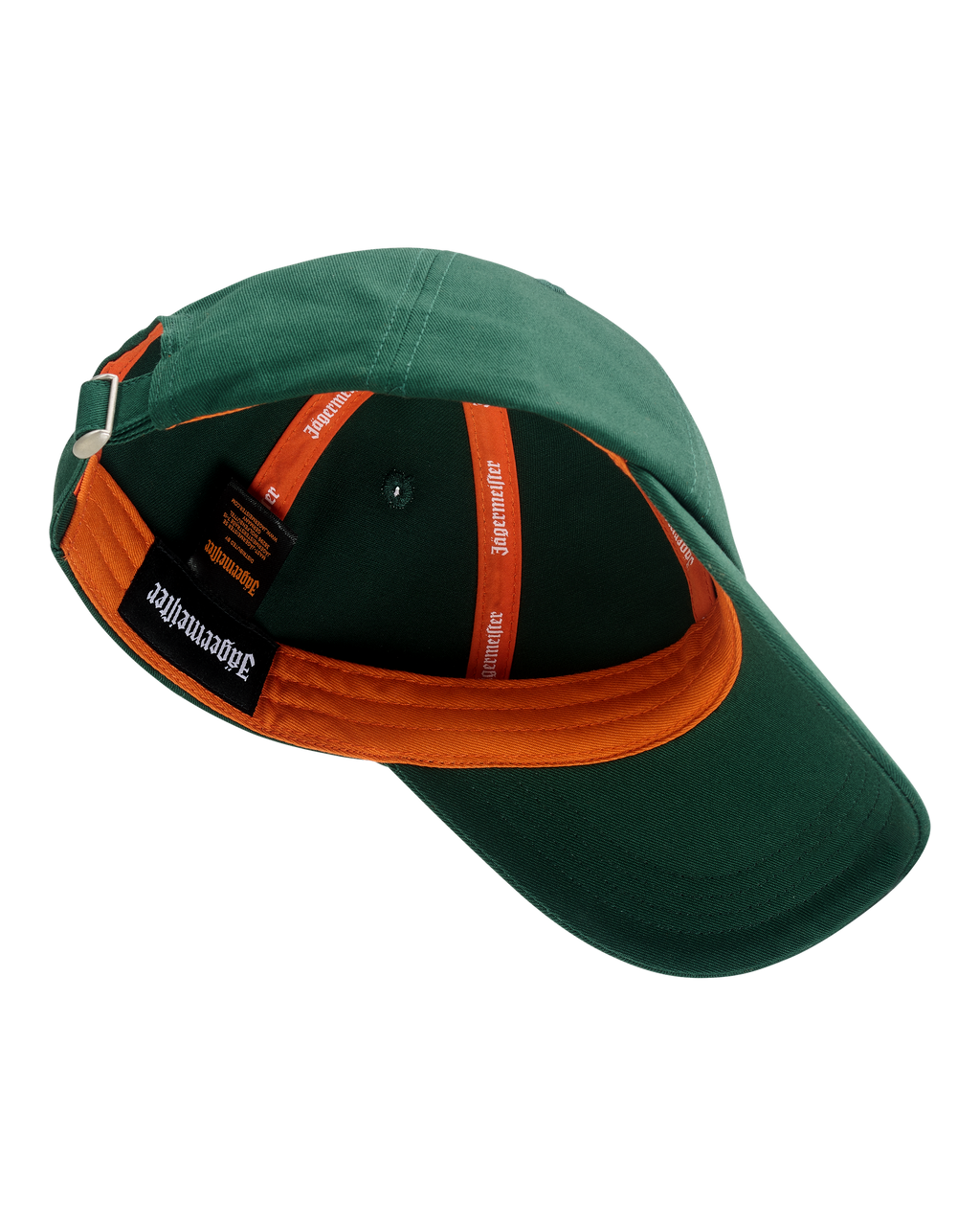 Groene Jägermeister dad cap met een zichtbaar merklogo aan de binnenkant van de pet.