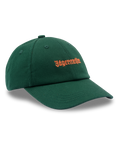 Groene Jägermeister dad cap met een oranje Jägermeister-wordmarklogo op de voorkant.