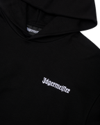 Zwarte hoodie met wit Jägermeister-logo op de borst.
