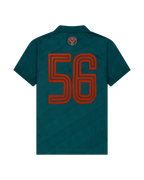 Groen Jägermeister-jersey met een oranje '56' op de achterkant.