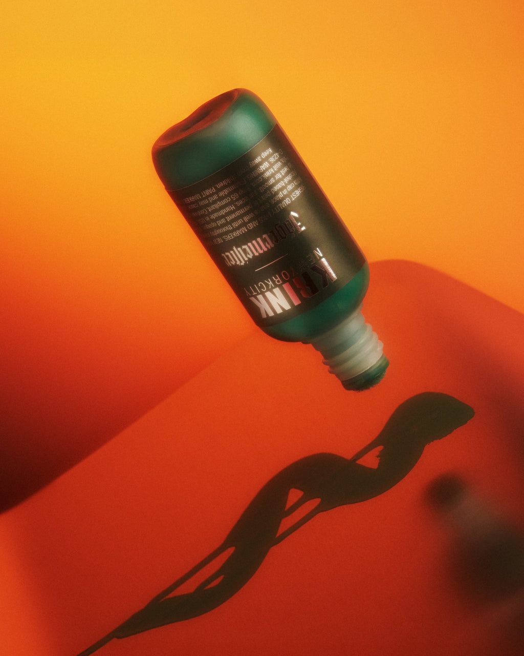 Groene Krink-marker met Jägermeister-branding op een rood-oranje verloopachtergrond