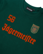 Groene Jägermeister-longsleeve met oranje Jägermeister-wordmark en een '56'.