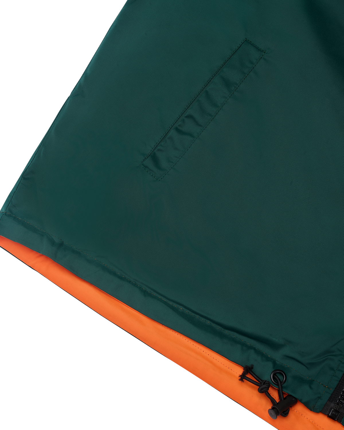 Groene en oranje stof van de omkeerbare Jägermeister-jas