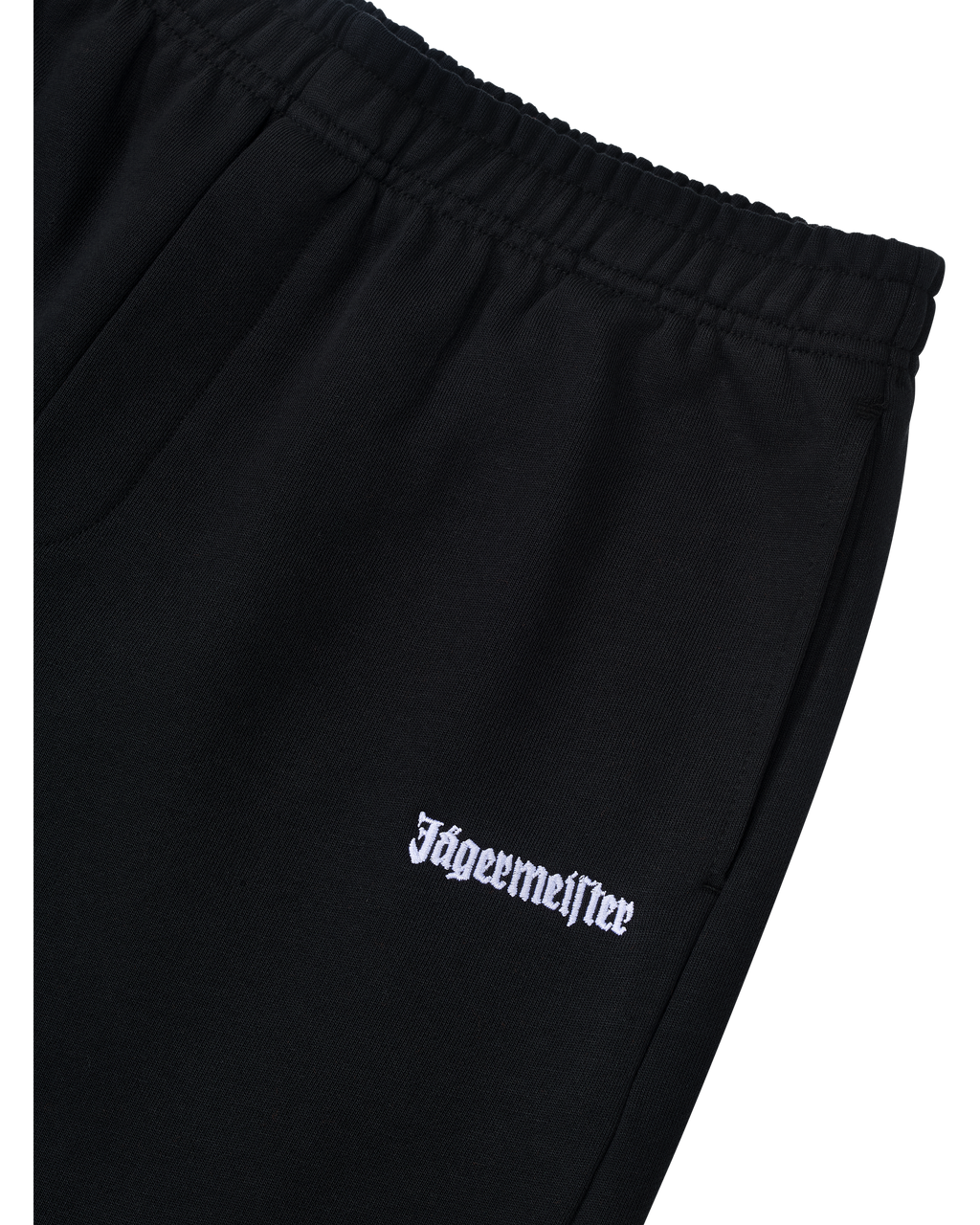 Black pants with white Jägermeister logo on the front.