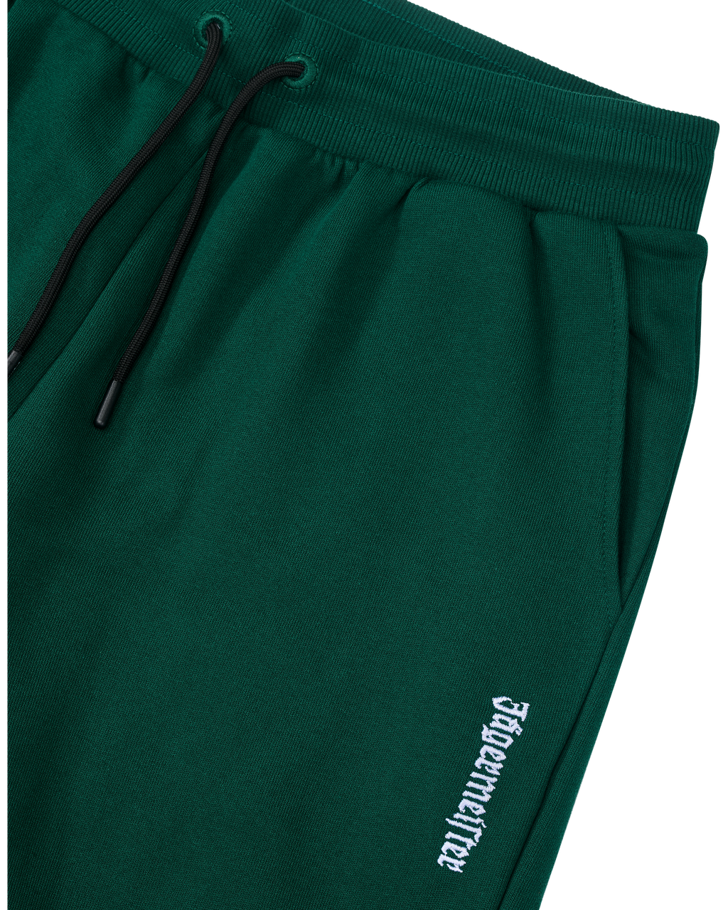 Groene Jägermeister-sweatpants met een wit logo.